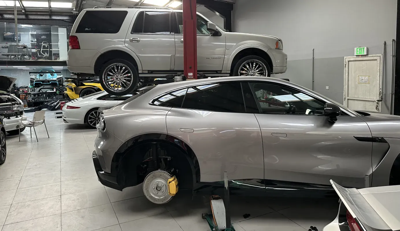 Sports car being serviced in the workshop
